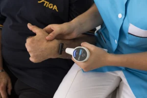 Photo du vibramoov physio sur un patient athlex